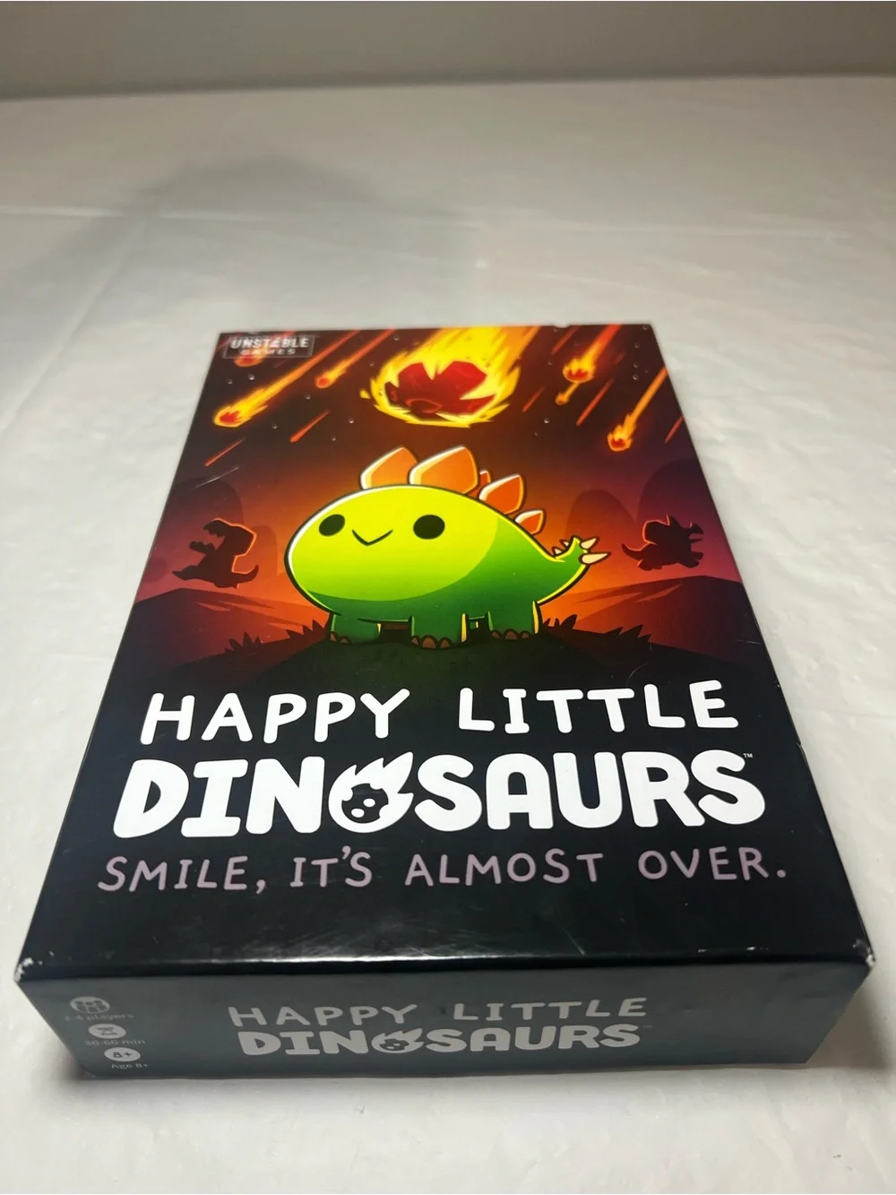 Unstable Games Happy Little Dinosaurs -Smile, It's Almost Over Board Game